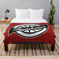 Soft and cozy plush blanket featuring the iconic Studebaker wheel logo in a retro design