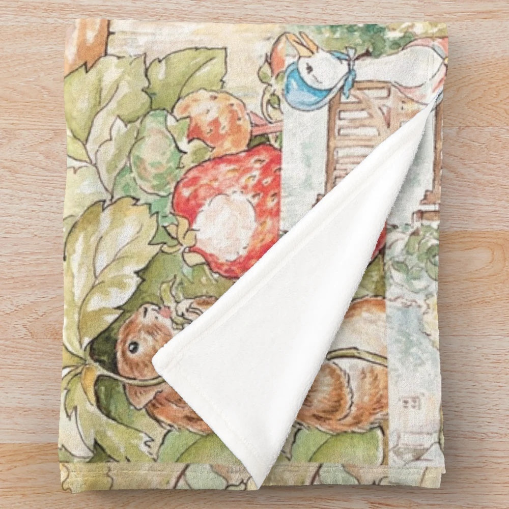 Vintage-style plush blanket featuring a large illustration of anthropomorphic animals from the world of Beatrix Potter