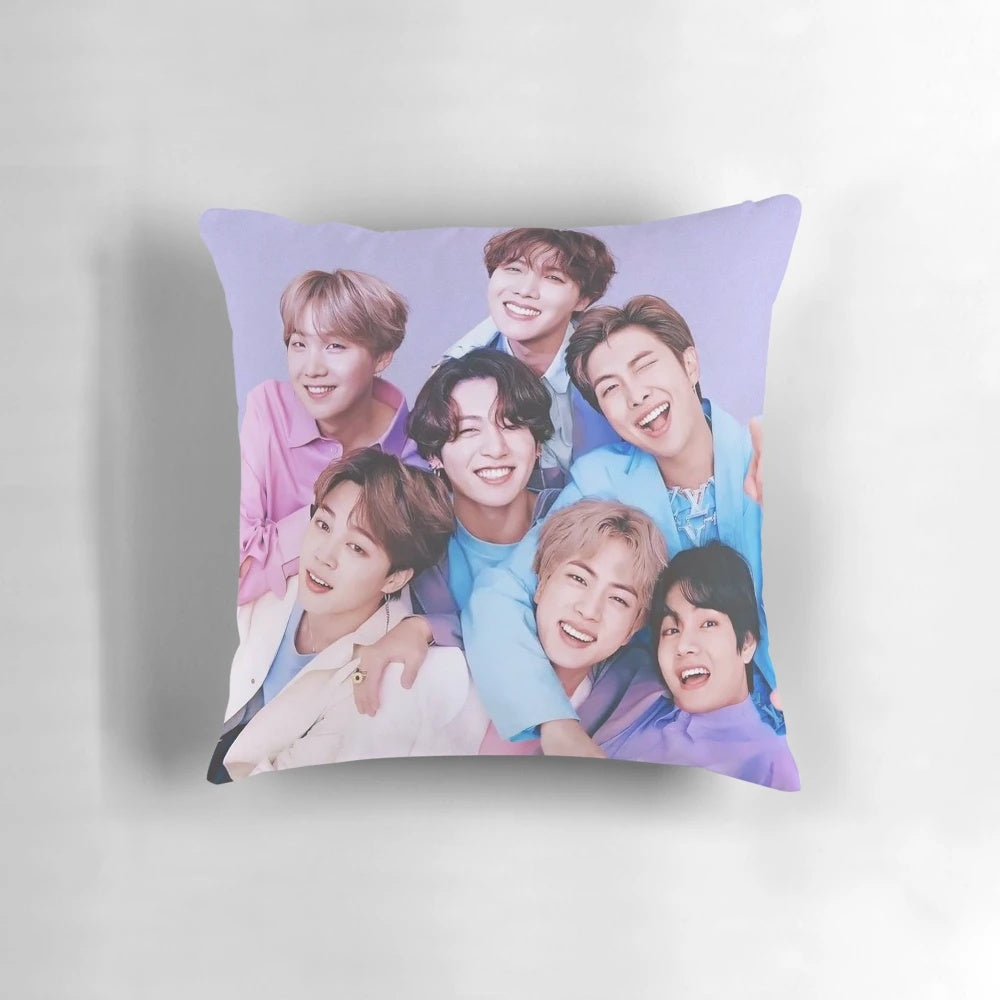 A vintage-inspired decorative pillow featuring the members of the popular K-pop group BTS.