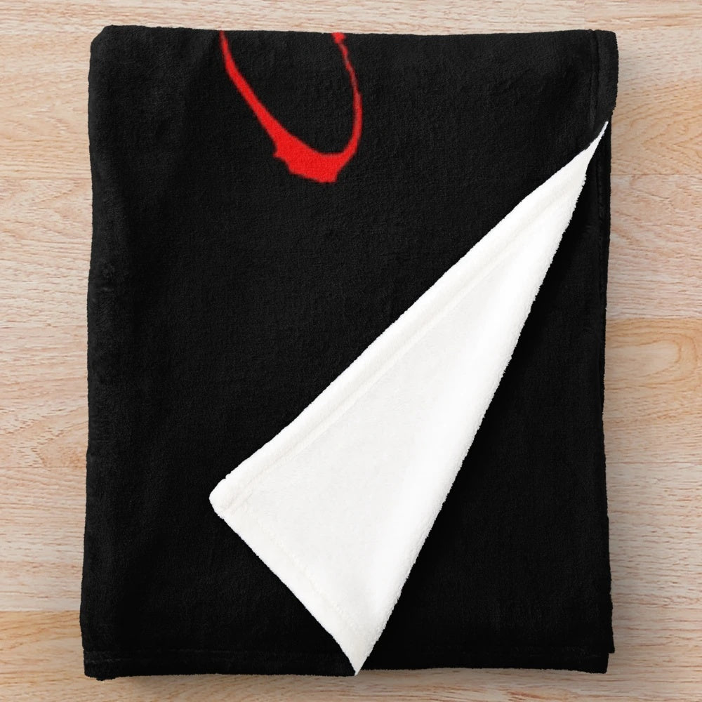 Vintage-style plush blanket featuring Dracula movie imagery