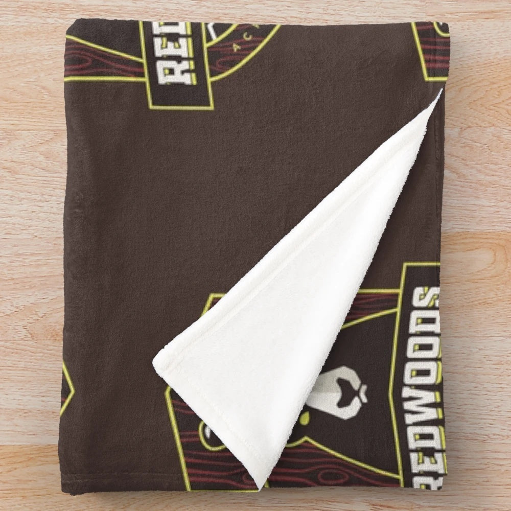 Vintage-style lacrosse plush blanket with team, sports, and cartoon design
