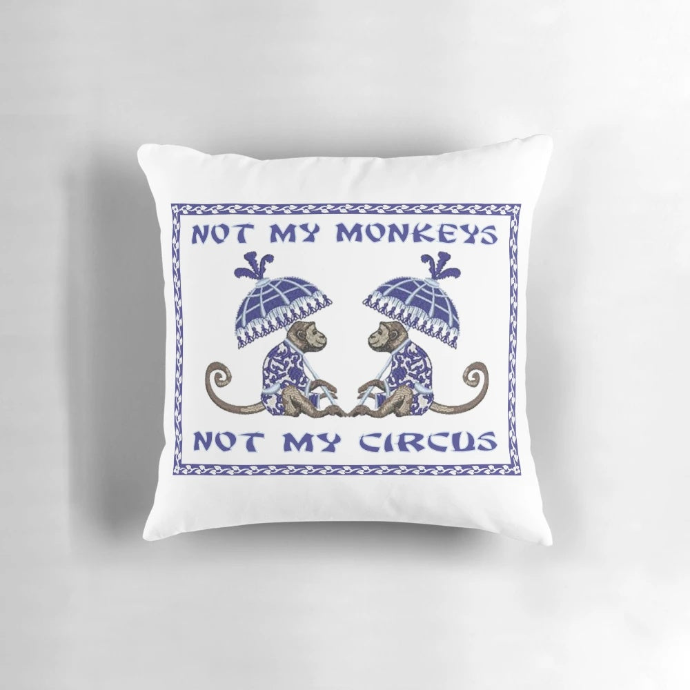 Vintage-inspired decorative throw pillow with a whimsical monkey design in a chinoiserie style.