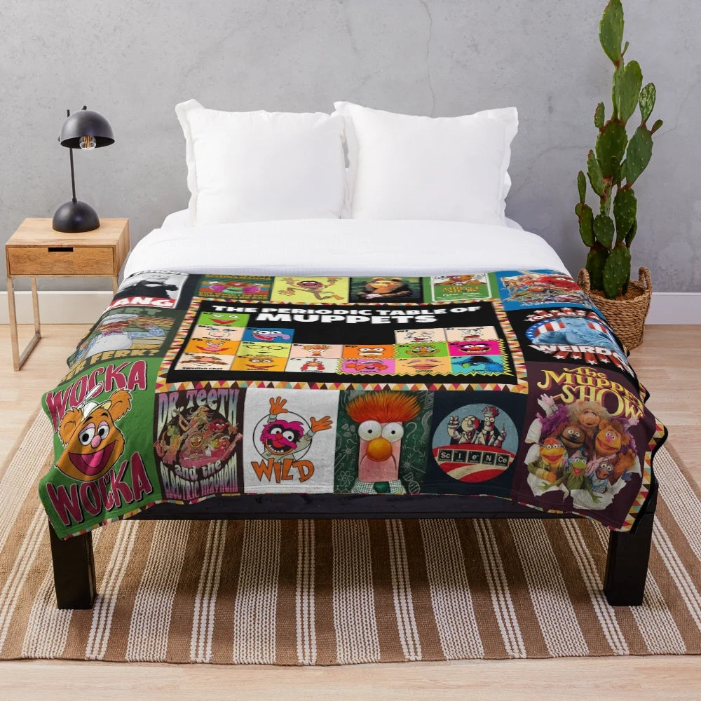 Vintage-style plush blanket featuring a collage of photos from the classic TV series The Muppet Show