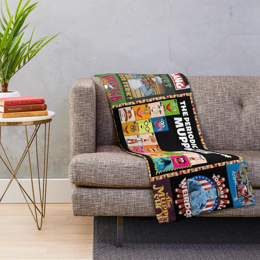 Vintage-style plush blanket featuring a collage of photos from the classic TV series The Muppet Show