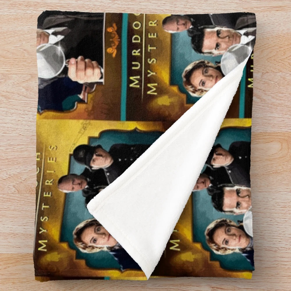 Vintage style plush blanket featuring characters from the Murdoch Mysteries television show