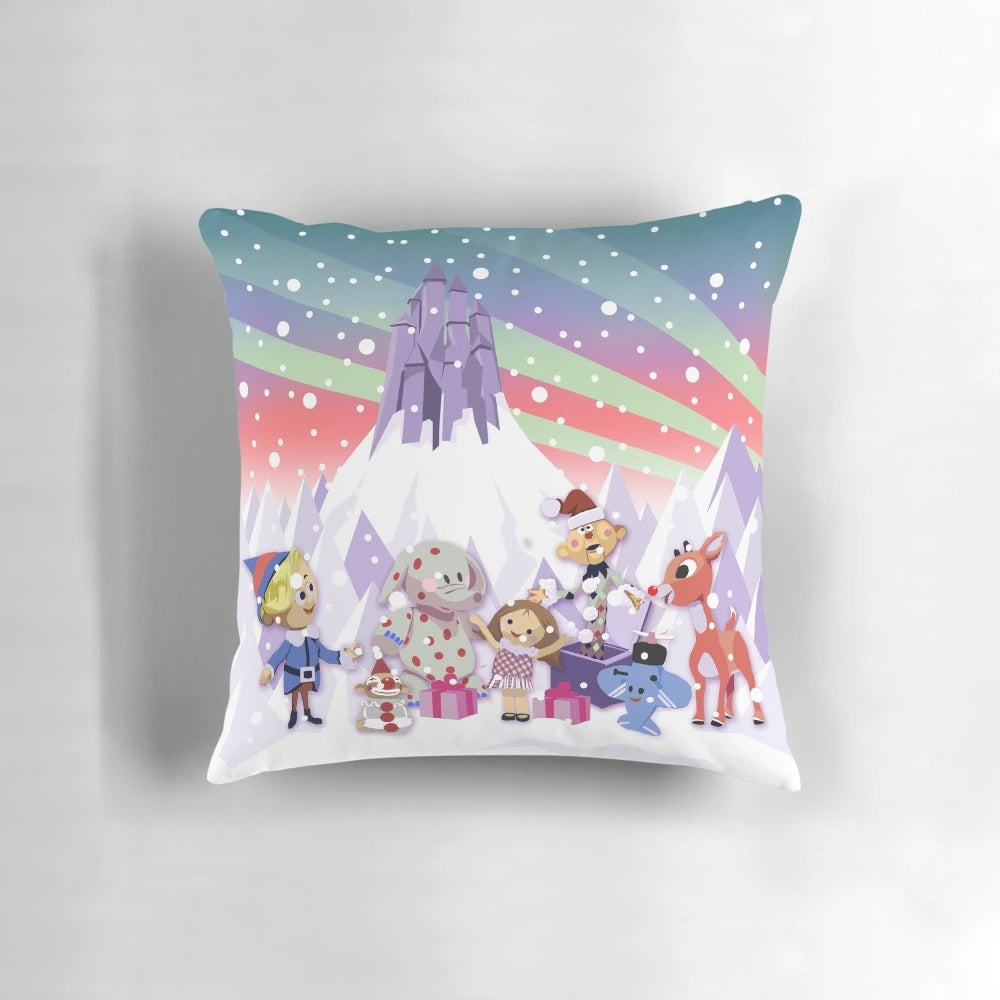 Vintage-style throw pillow featuring Rudolph the Red-Nosed Reindeer and the Island of Misfit Toys from the classic Rankin/Bass Christmas special.
