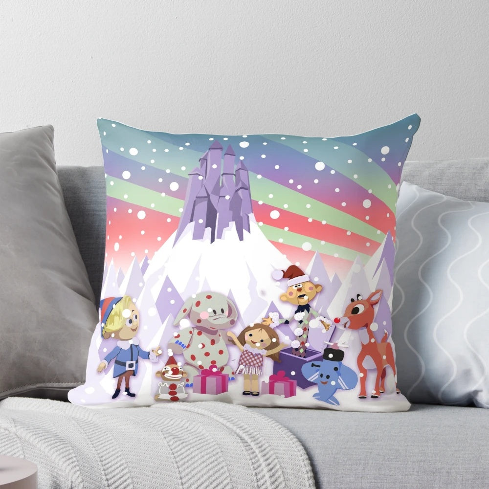 Vintage-style throw pillow featuring Rudolph the Red-Nosed Reindeer and the Island of Misfit Toys from the classic Rankin/Bass Christmas special.