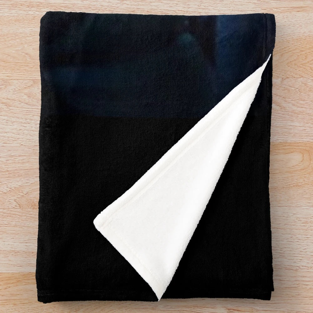 Vintage-style plush blanket featuring a character from the Scream movie franchise
