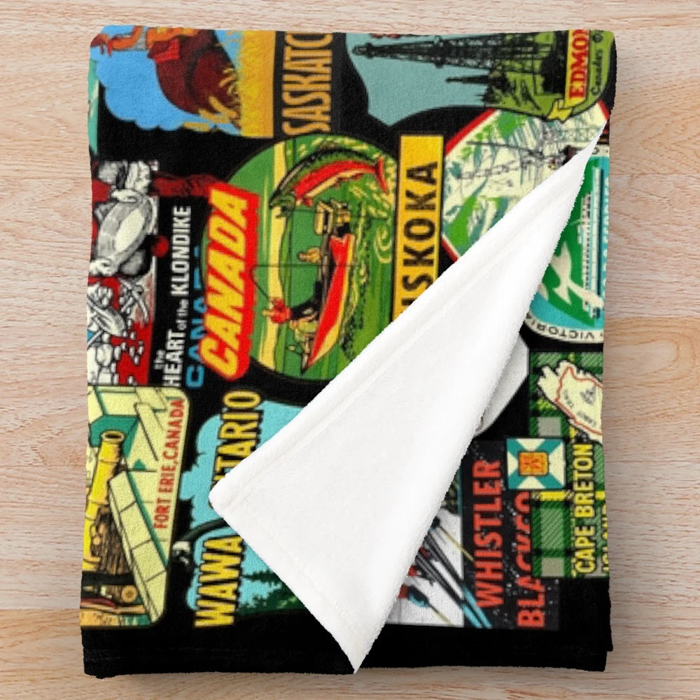 Sticker bomb pattern plush blanket with vintage Canada travel imagery