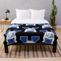 Vintage-style Yale Bulldogs plush blanket with retro mascot design