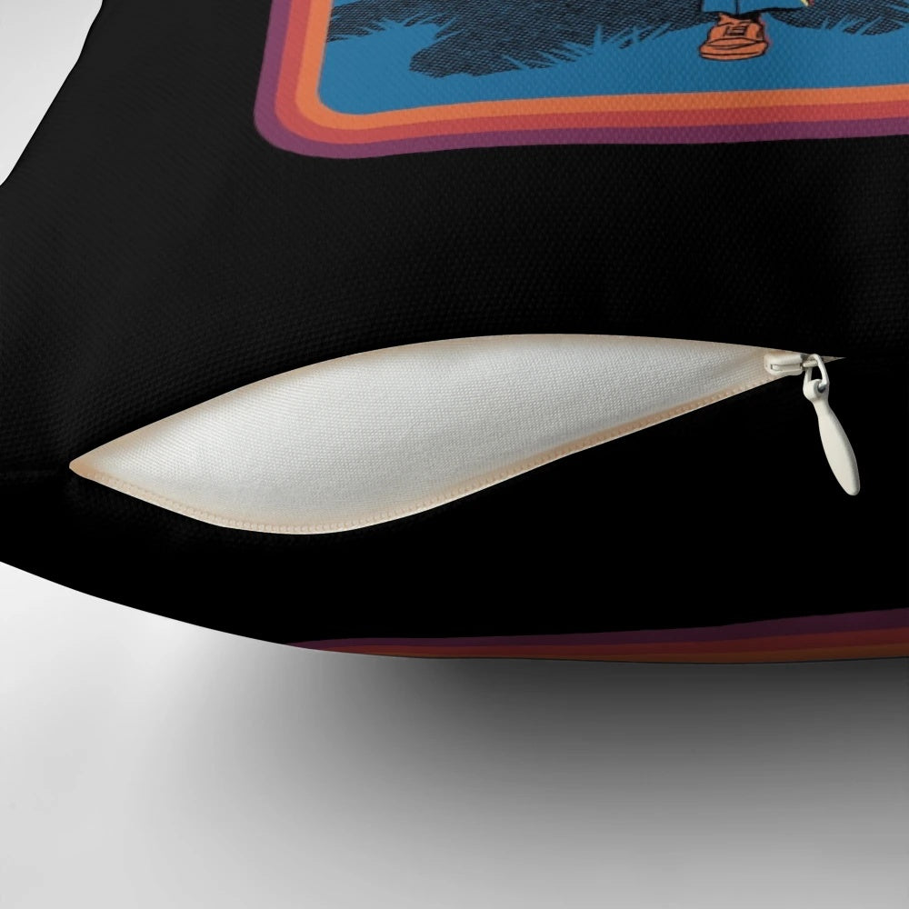 Vintage-style pillow featuring a playful grim reaper chasing a person with the text "Tag, You're It