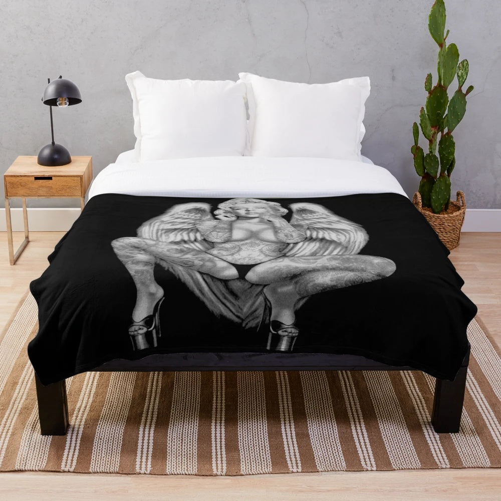Vintage plush blanket featuring a surreal abstract print of Marilyn Monroe as a tattooed angel