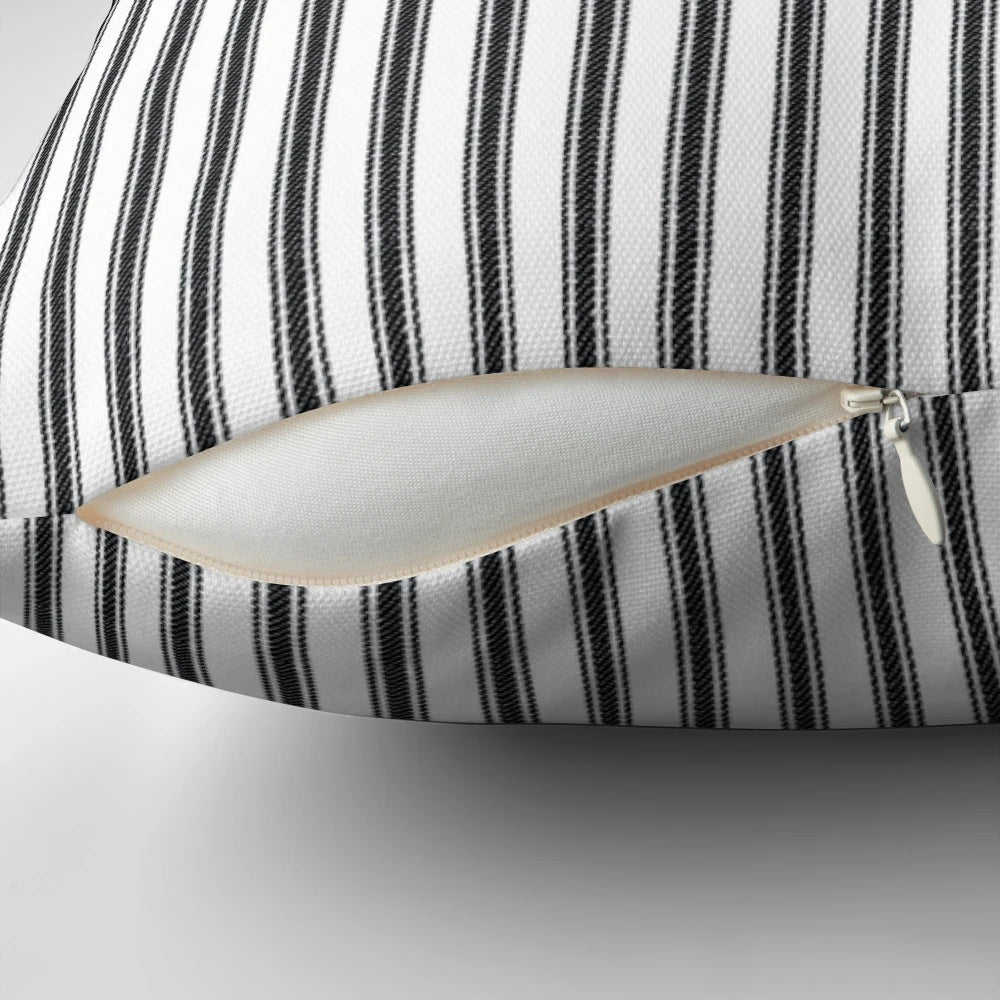 Vintage-inspired black and white ticking stripe pillow for home decor