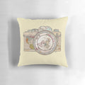 Vintage-inspired travel pillow with floral pattern and world map graphics