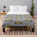 Plush blanket featuring a vibrant illustration of a classic Triumph Stag sports car