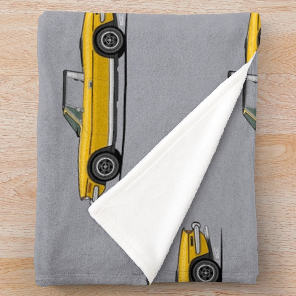 Plush blanket featuring a vibrant illustration of a classic Triumph Stag sports car