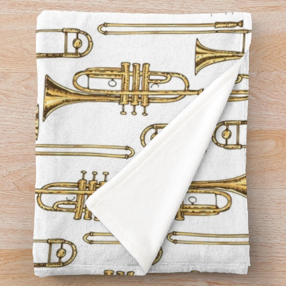 Cozy plush blanket featuring a vintage-style trumpet design for music enthusiasts