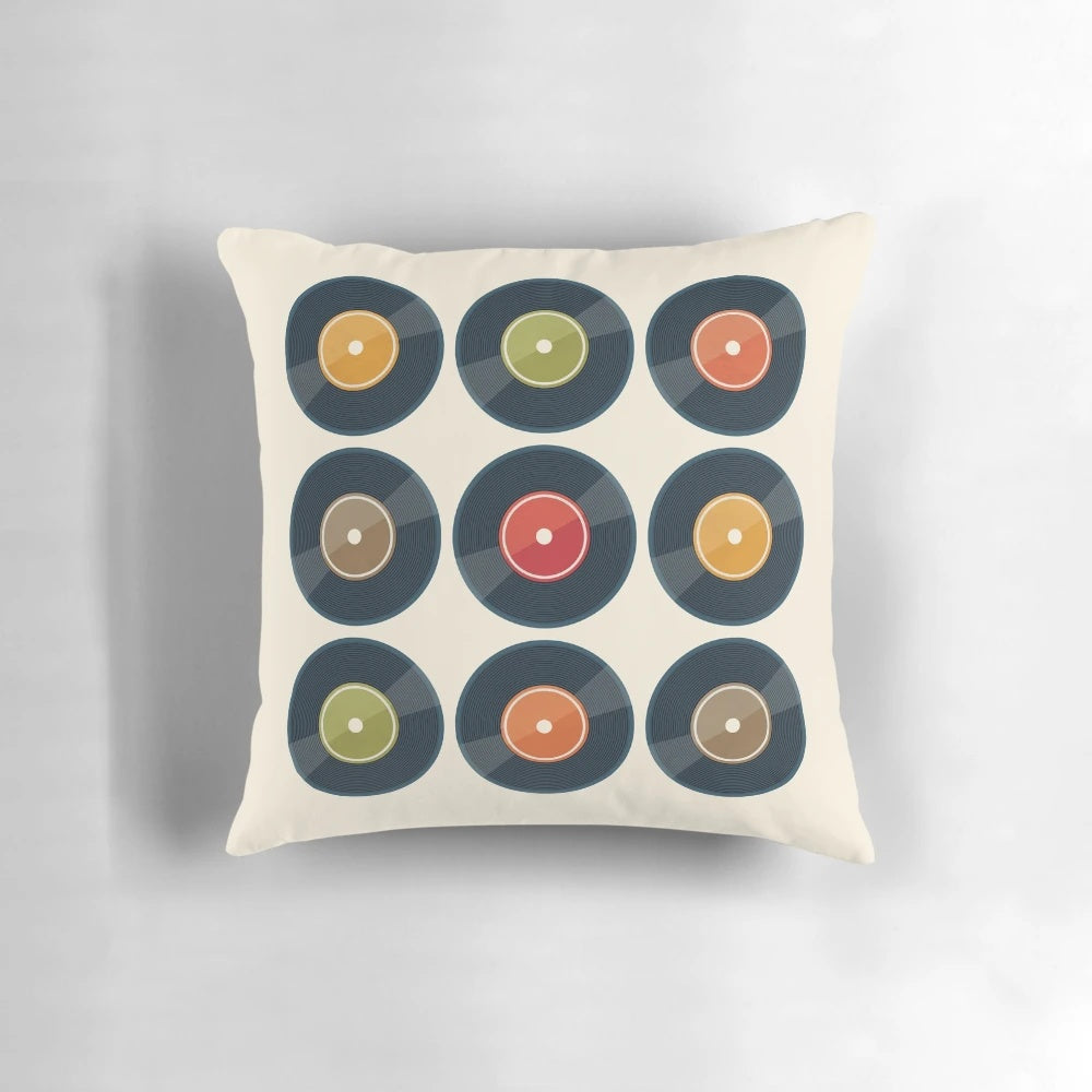 Vintage vinyl record-inspired throw pillow with a minimalist, retro design