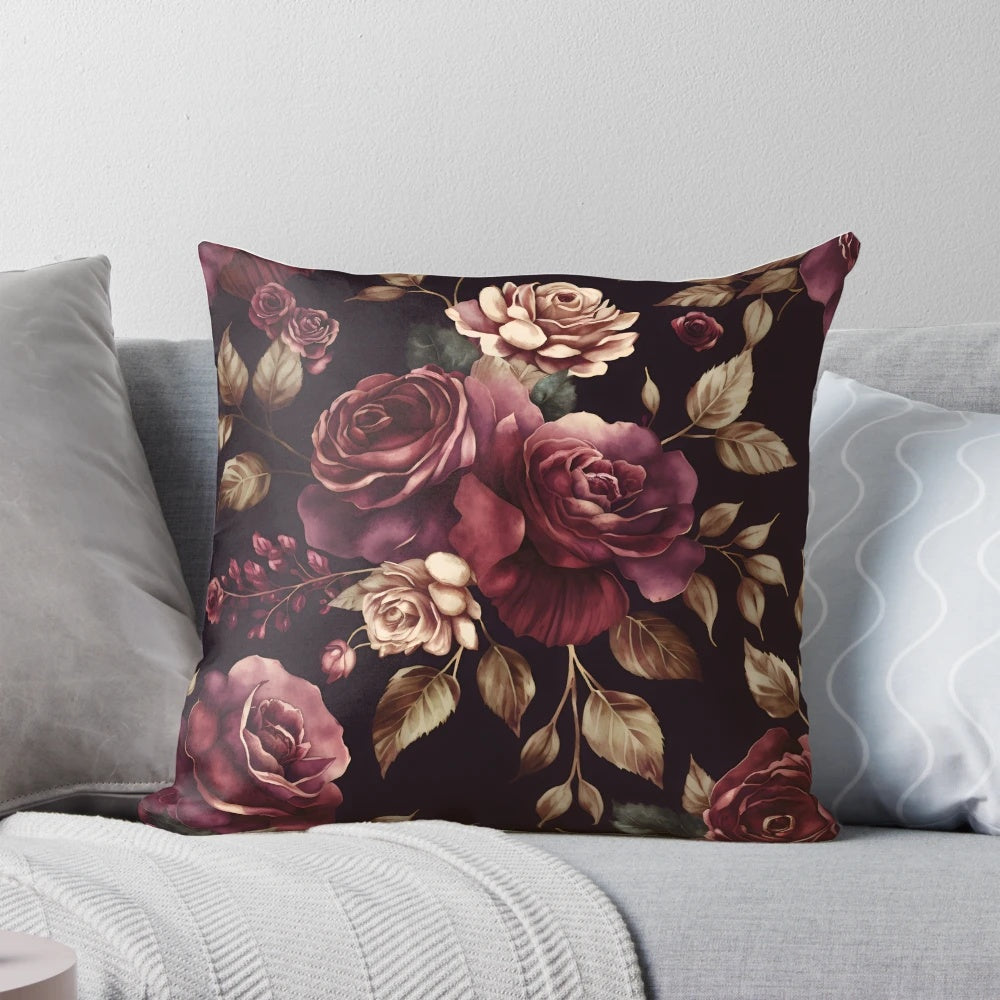 Vintage-style abstract watercolor painting of burgundy roses and botanical garden flowers on a decorative throw pillow