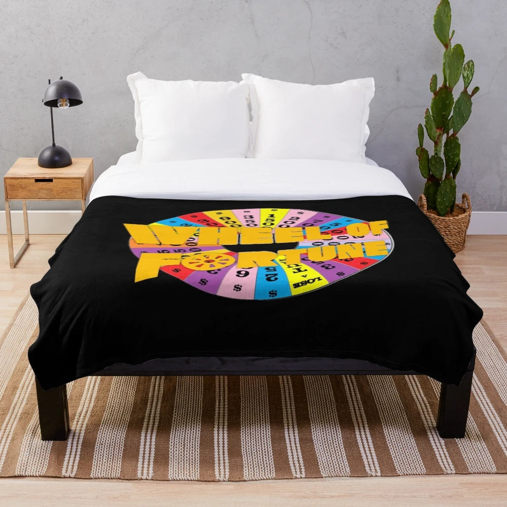 Vintage Wheel of Fortune themed plush blanket