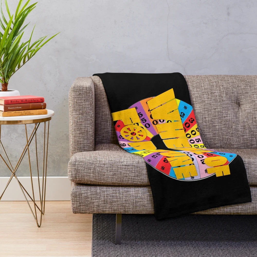 Vintage Wheel of Fortune themed plush blanket