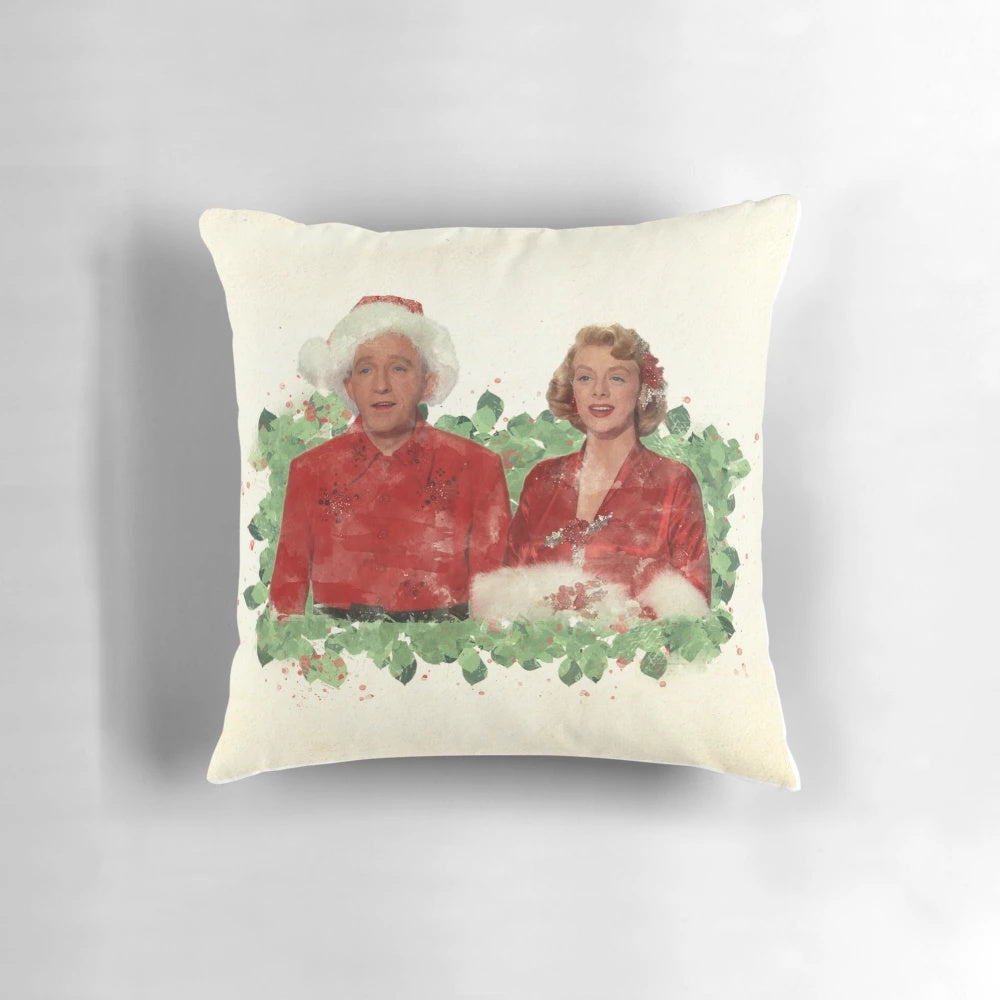 Vintage white Christmas pillow featuring characters Bob Wallace and Betty Haynes from the classic movie "White Christmas"