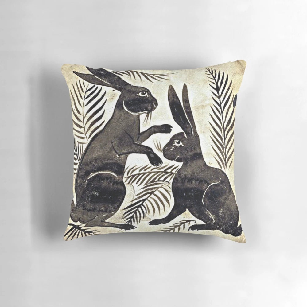 Vintage-style decorative throw pillow featuring a pattern of whimsical hares, inspired by the designs of William de Morgan.