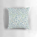 Vintage-inspired William Morris pillow featuring a beautiful botanical leaf pattern in shades of blue and green on an off-white background.