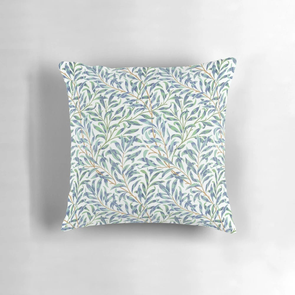 Vintage-inspired William Morris pillow featuring a beautiful botanical leaf pattern in shades of blue and green on an off-white background.