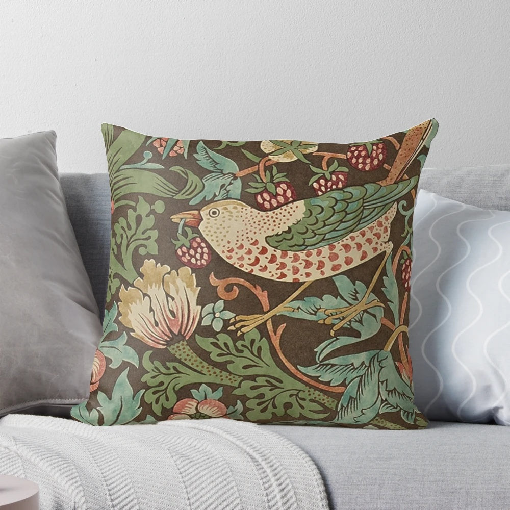 Vintage William Morris "Strawberry Thief" floral pattern pillow, featuring botanical art in chartreuse and red tones.