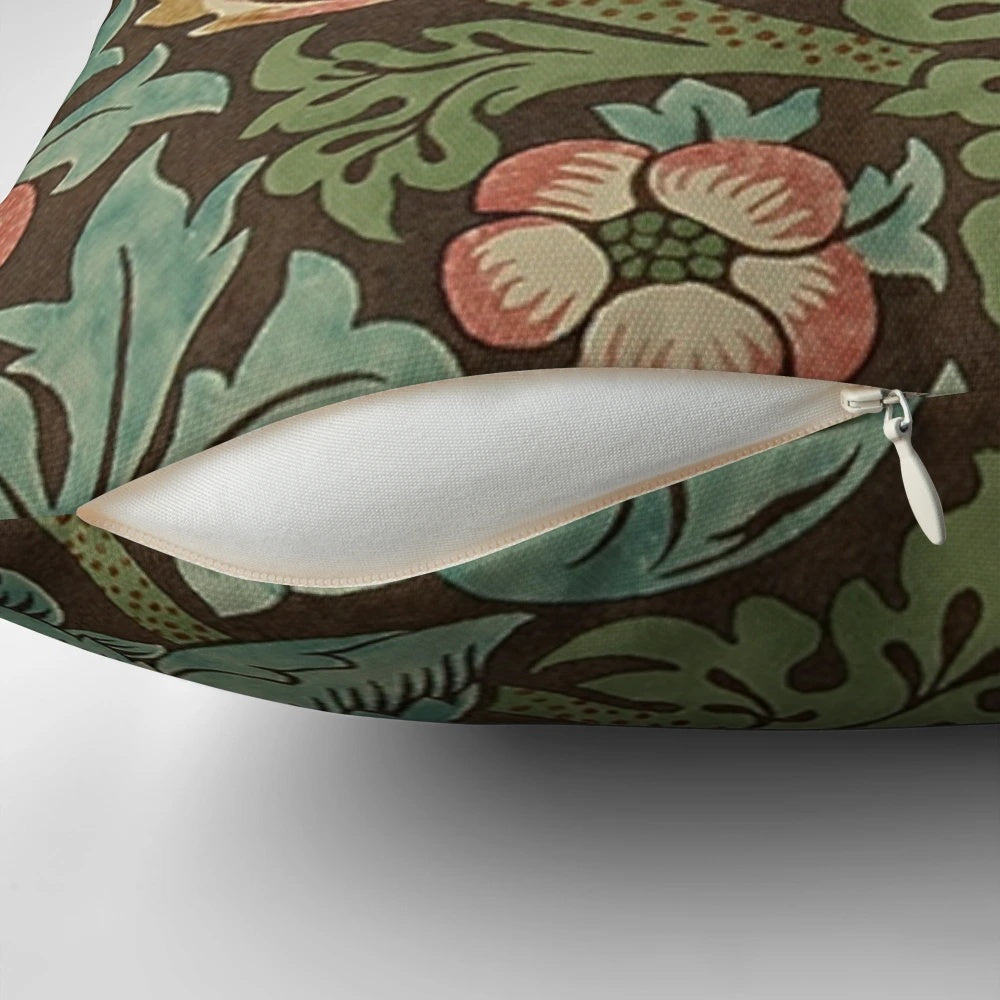 Vintage William Morris "Strawberry Thief" floral pattern pillow, featuring botanical art in chartreuse and red tones.