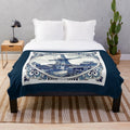 Vintage windmill print plush blanket featuring a whimsical Dutch Blue Delft style design