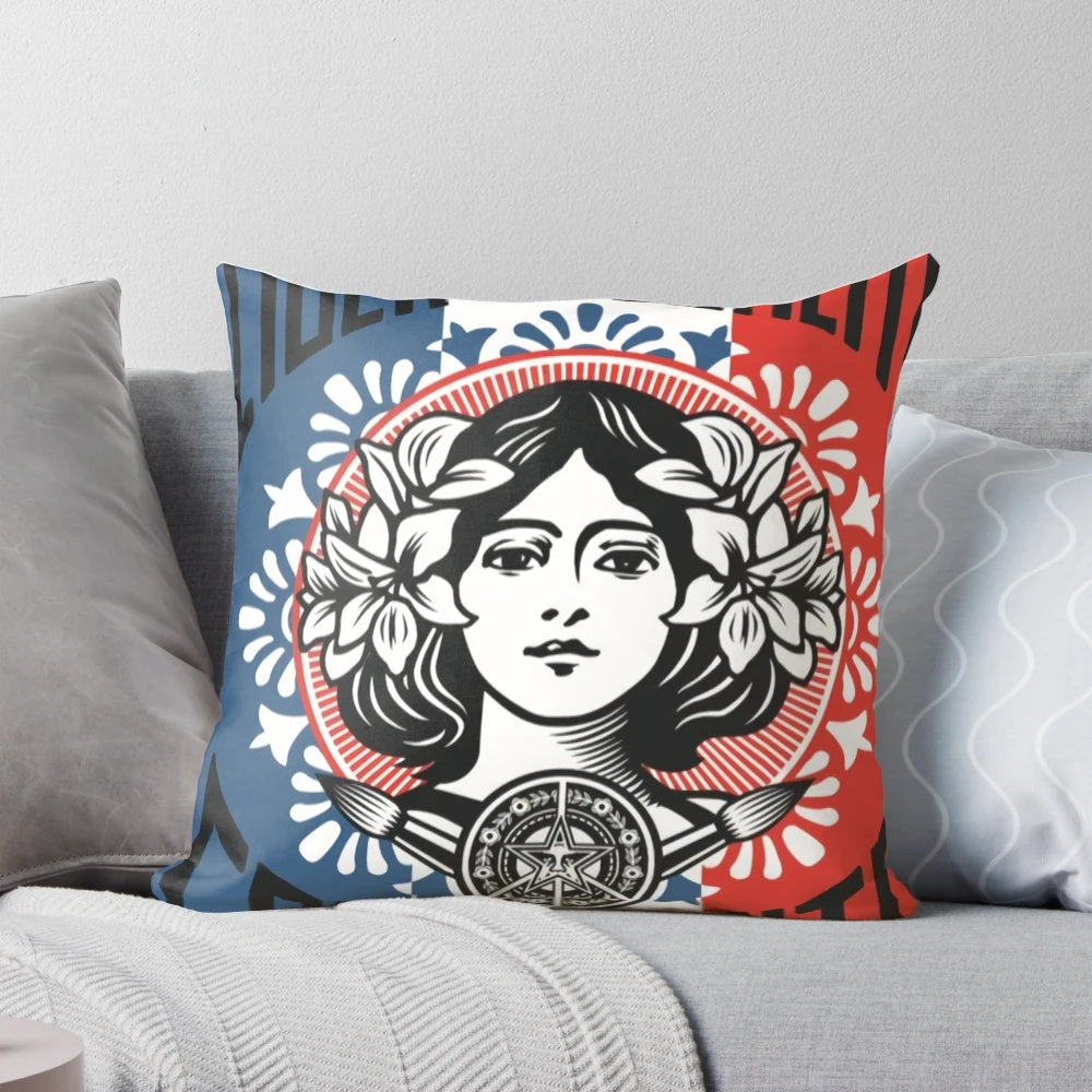 Vintage-inspired pillow with the words "Liberte, Egalite, Fraternite" and an Angela Fairey-style design