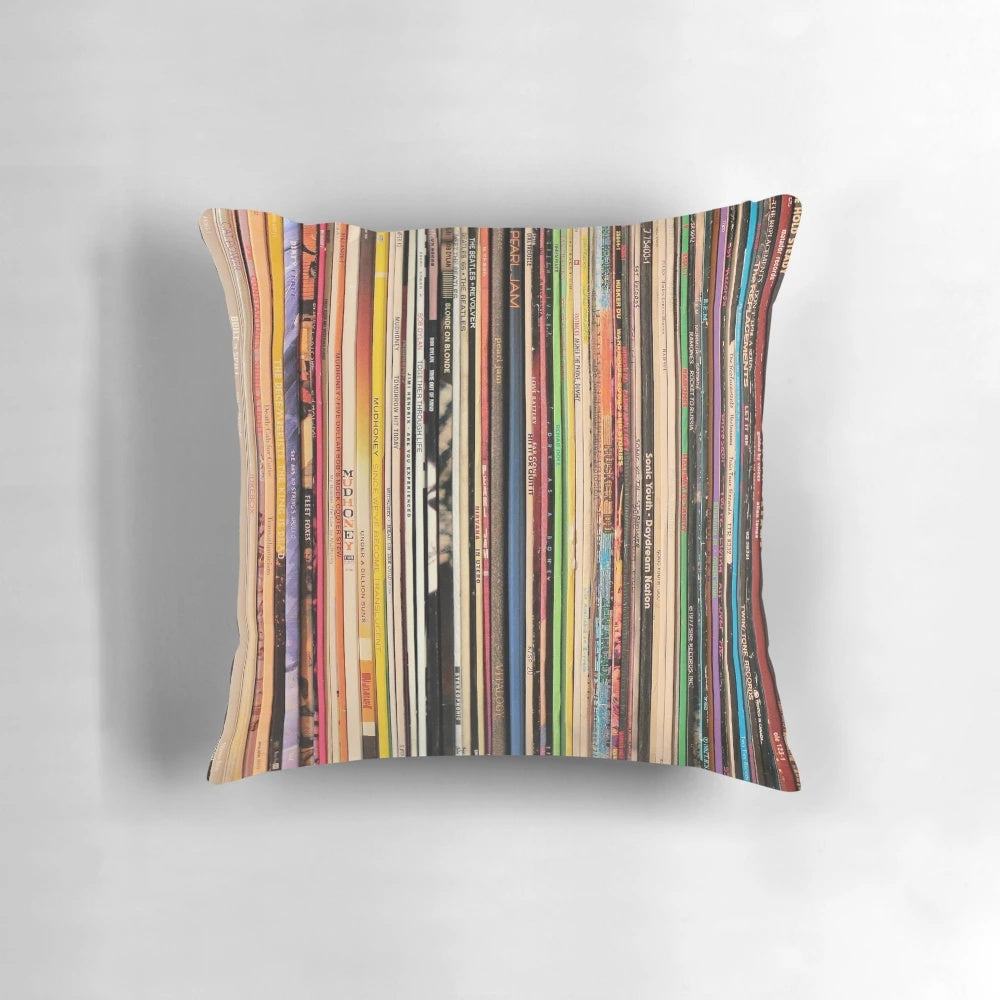 A cozy, stylish pillow featuring a design of vintage vinyl records, perfect for record collectors and music enthusiasts.