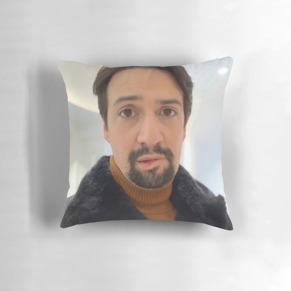 Pillow featuring the popular "Manuel Miranda lip bite" meme from the Hamilton musical and TikTok.