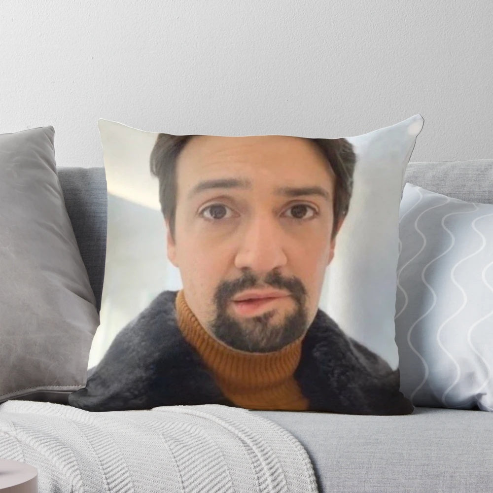 Pillow featuring the popular "Manuel Miranda lip bite" meme from the Hamilton musical and TikTok.