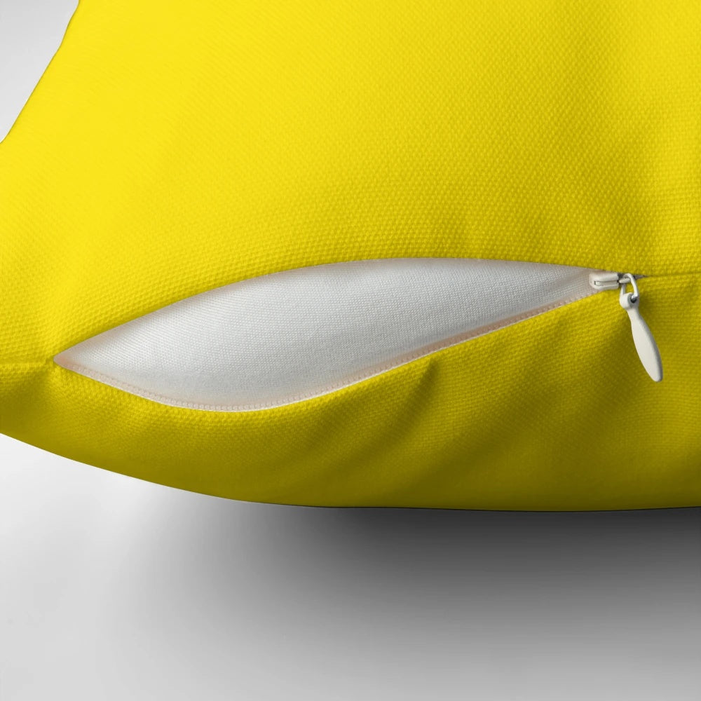 Vivid yellow pillow featuring a range of sunny and vibrant yellow hues