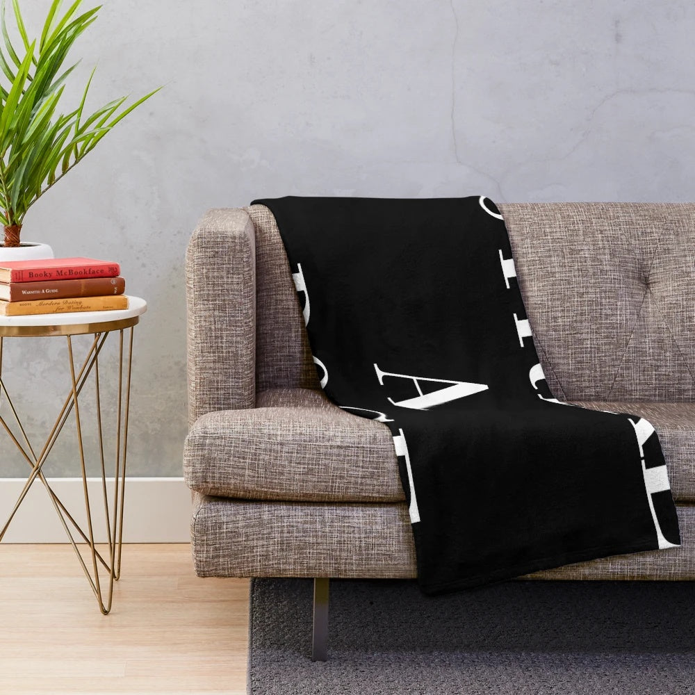 Vogue-inspired plush blanket with a fashionable design