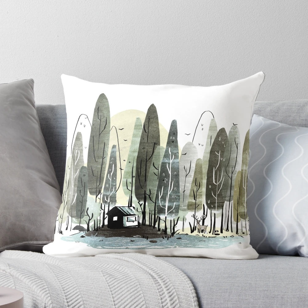 Walden-inspired pillow with nature motifs including forest, deer, and woods