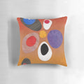 Warm, rich-colored abstract retro-style painting collage design on a throw pillow.