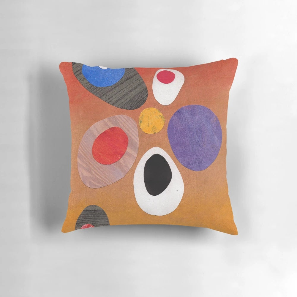 Warm, rich-colored abstract retro-style painting collage design on a throw pillow.