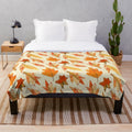 Warm yellow autumn leaf patterned plush blanket