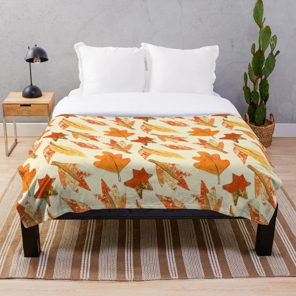 Warm yellow autumn leaf patterned plush blanket