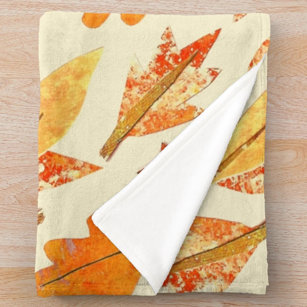 Warm yellow autumn leaf patterned plush blanket