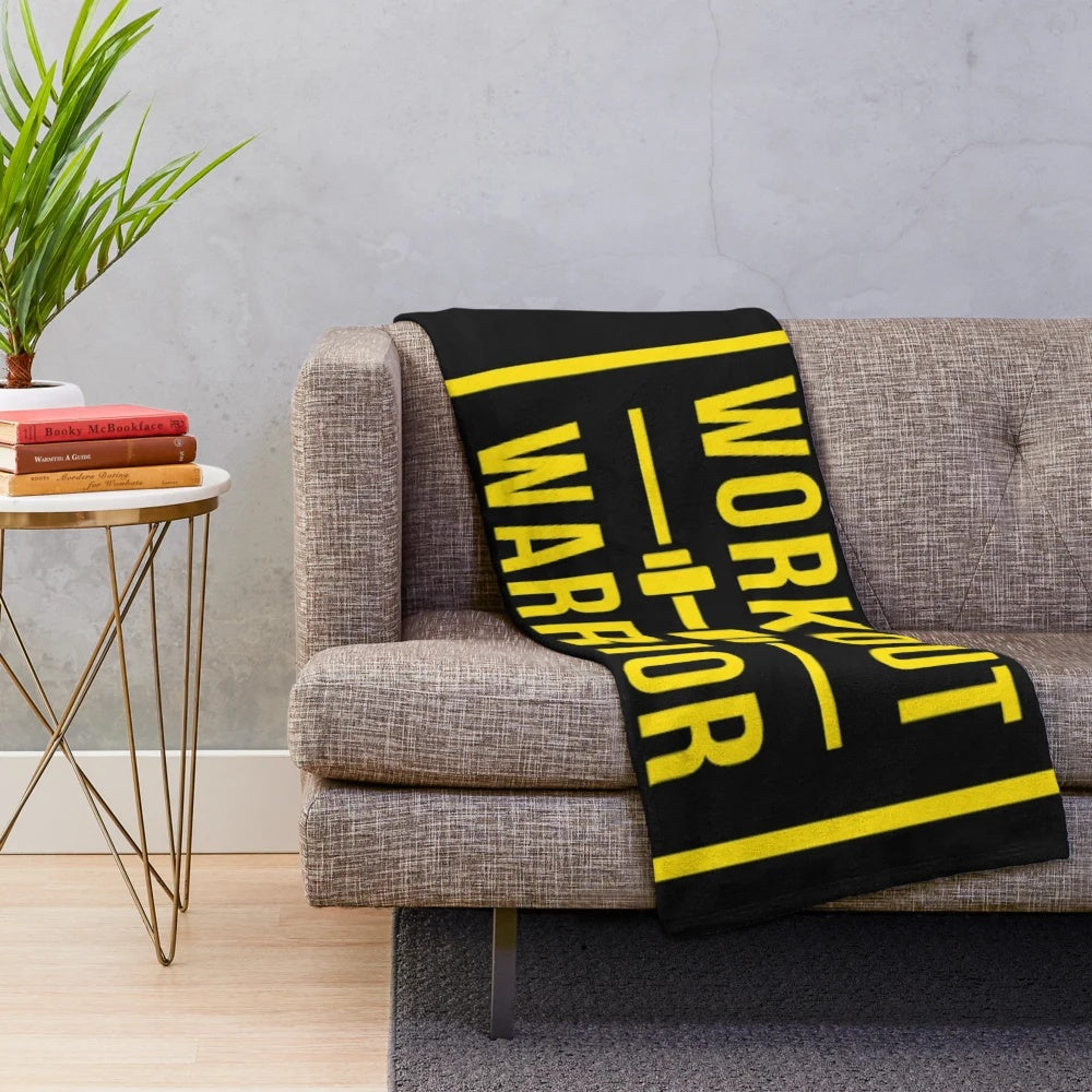 Warrior-inspired plush blanket with gold and black design
