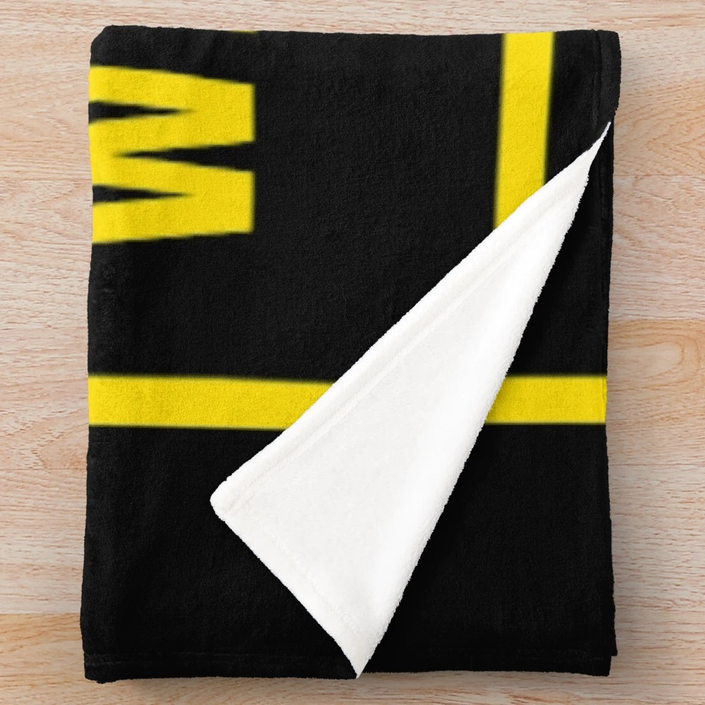 Warrior-inspired plush blanket with gold and black design