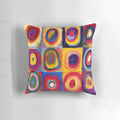 Vibrant abstract art pillow featuring the signature circular and geometric style of renowned Russian artist Wassily Kandinsky.