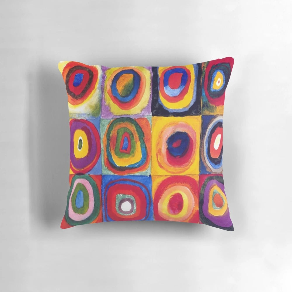 Vibrant abstract art pillow featuring the signature circular and geometric style of renowned Russian artist Wassily Kandinsky.