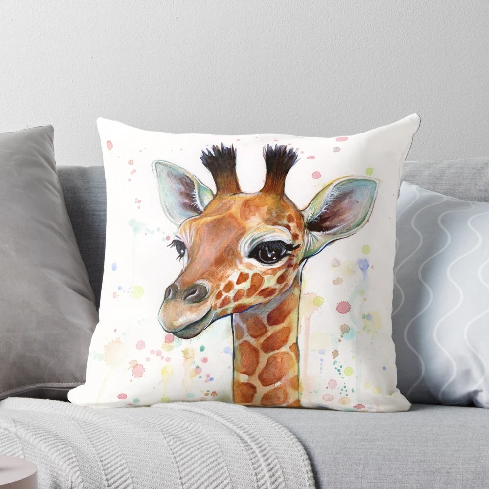 A watercolor painting of a cute baby giraffe on a decorative pillow for a nursery or child's room.
