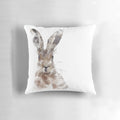 Watercolor painting of a brown hare on a throw pillow